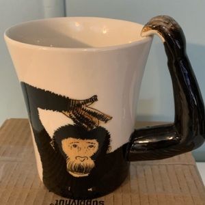 Pier One Chimpanzee arm coffee mug